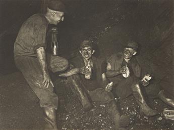 (MINING--GERMANY) An album titled "Im Pütt" with 14 handsome photographs of workers in a mine. 1953.